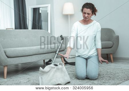 Housewife Feeling Allergic To Dust From Vacuum Cleaner