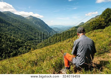 A Man Hiking In Pyrenees Mountains, France