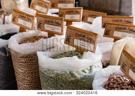 Cangas De Onis, Spain - March 31, 2019: Assortment Of Beans And Other Legumes In Sacks In Food Marke