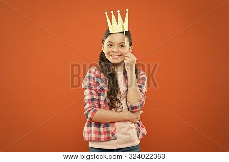 Prop, To Make It Really Fun. Happy Girl Wearing Crown Photobooth Prop On Orange Background. Happy Li