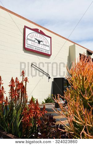 SANTA BARBARA, CALIFORNIA - APRIL 11, 2019: The Shalhoob Meat Company open air patio restaurant known as the Funk Zone Patio in the heart of the Art and Wine District.