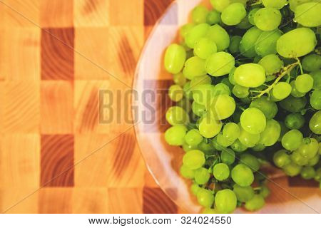 Green Grape On The Wooden Cutting Board