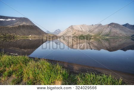 The Picturesque Lake Ketachan In Kamchatka, Russia. Bystrinsky National Park, Near The Volcano Ichin