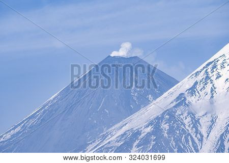 View On Kamen Volcano, Active Klyuchevskoy Volcano And Active Bezymianny Volcano.