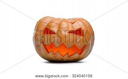Photo Of Halloween Pumpkin. Scary Jack Olantern Isolated On White
