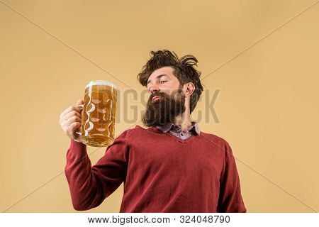 Oktoberfest Festival. Brewery Concept. Man With Beer Of Mug. Alcohol. Male Brewer Holds Glass With B