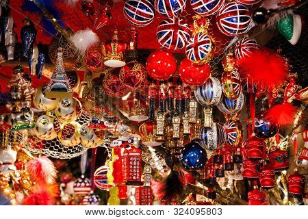 British themed glass Christmas tree decorations for sale at Christmas market (Christkindlmarkt) stall in Central Berlin, Germany