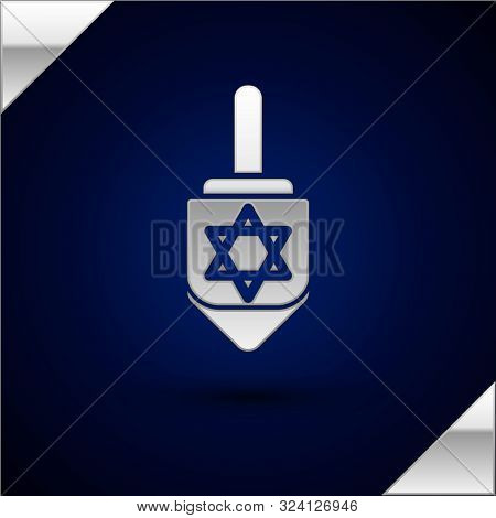 Silver Hanukkah Dreidel Icon Isolated On Dark Blue Background. Vector Illustration