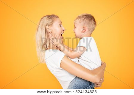 Mother With Little Boy Having Fun Together.