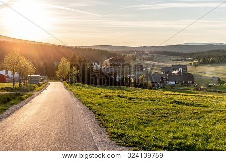 Jizerka Village At Sunset Time. View From Bukovec Mountain, Jizera Mountains, Czech Republic