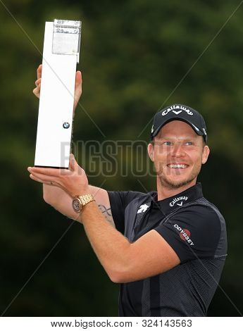 VIRGINIA WATER, ENGLAND. 22 SEPTEMBER 2019: Danny Willett celebrates winning the BMW PGA Championship, European Tour Golf Tournament at Wentworth Golf Club