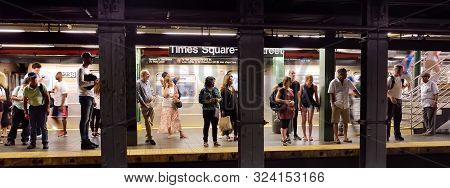 New York, Usa - July 9, 2019: Crowd Of People On Subway Station Times Squre Street In New York City.