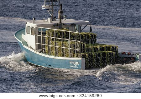 Fairhaven, Massachusetts, Usa - September 21, 2019: Lobster Boat Voyager Leaving Fairhaven Stacked W