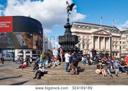 LONDON,UK - AUGUST 19,2019 : The statue of Eros at Piccadilly Circus, a worldwide famous London landmark