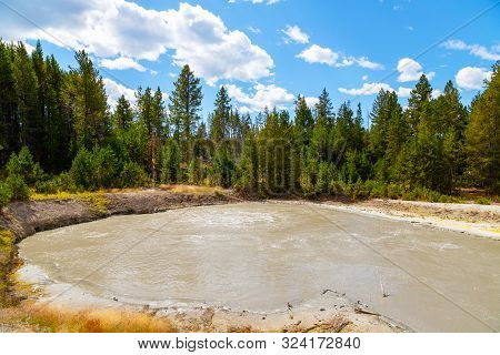 Black Dragon Cauldron's Mudpot At Mud Volcano In Yellowstone National Park
