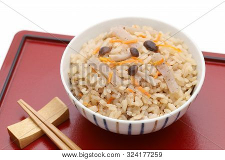 Japanese Food, Takikomi Gohan Boiled Rice On Red Tray