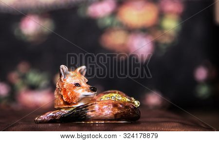 Vintage Porcelain Fox Figurine Figure Laying Before Flowery Background Resting Ceramic Fox
