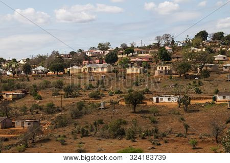 Housing And Huts Scattered Informally On Hill In Rural South Africa