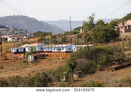 Huts And Housing All Painted Blue Inidentifying Formal Homestead