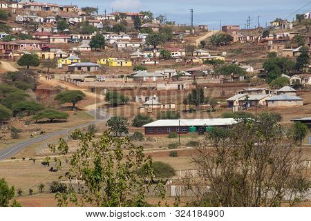 Housing And Huts Scattered Informally On Hill In Rural South Africa
