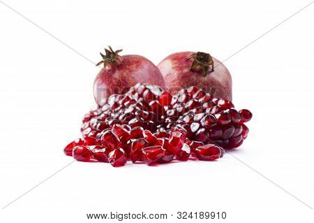 Pomegranate Isolated On White Background. Sweet And Juicy Garnet With Copy Space For Text. Garnets I