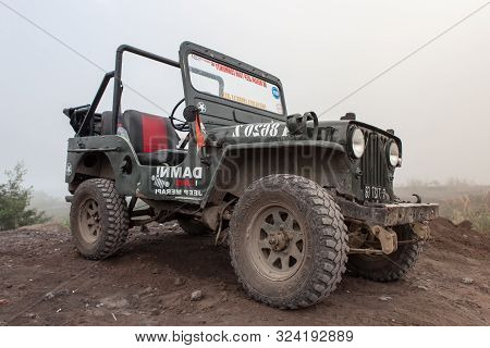 Kaliurang/indonesia - Apr 6, 2015: Jeep Near Merapi Volcano At Java Island. Version 2.