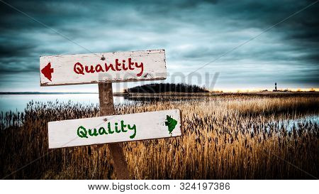 Street Sign The Direction Way To Quality Versus Quantity