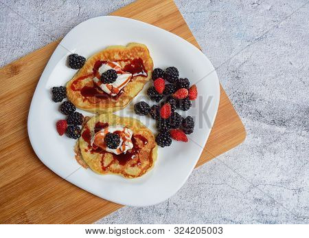 Pancakes With Fresh Blackberries And Raspeberries, Top View, Horizontal