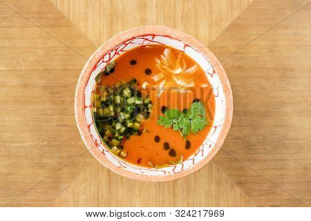 Gaspacho Soup In Bowl. Traditional Spanish Cold Soup Puree Gaspacho Or Gazpacho On Wooden Table