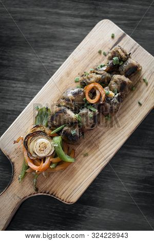 Grilled Fresh Sausage Starter Tapas Snack Set On Rustic Wood Board