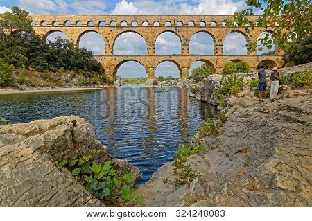 Remoulins, France, September 20, 2019 : The Pont Du Gard, The Highest Roman Aqueduct Bridge, And One