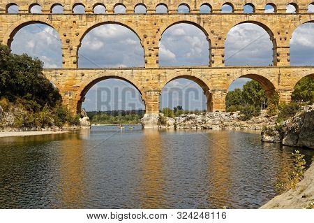Remoulins, France, September 20, 2019 : The Pont Du Gard, The Highest Roman Aqueduct Bridge, And One