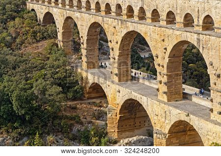 Remoulins, France, September 20, 2019 : The Pont Du Gard, The Highest Roman Aqueduct Bridge, And One