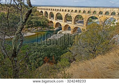 Remoulins, France, September 20, 2019 : The Pont Du Gard, The Highest Roman Aqueduct Bridge, And One