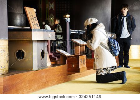 Japanese People And Thai Women Visit And Praying Fudo Myoo Or Acala In Daitou Or Great Peace Pagoda 