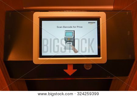 Seattle, Wa/usa-9/15/19: The Barcode Scanning Device At The Original University District  Amazon Boo