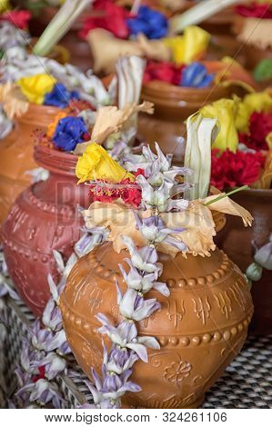 Kalash With Crown Flower Chain, Bel And Mango Leaf, Datura And Hibiscus With Floral Decoration. Esse