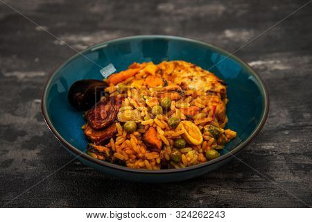 Prawn with rice - closeup of prawn with rice - traditionnal spanish food paella