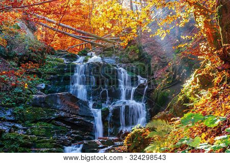 Beautiful Autumn Scenery Near The Waterfall Shypot. Popular Destination Of Ukrainian Carpathians. Tr