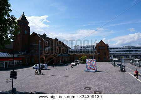 Giessen, Germany - August 13: Colorfully Painted Sections And Segments Of The Berlin Wall Stand On T