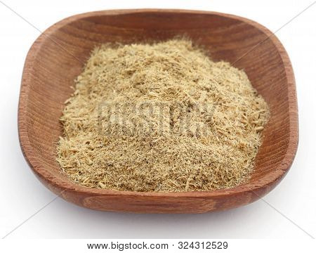 Liquorice In A Bowl Over White Background