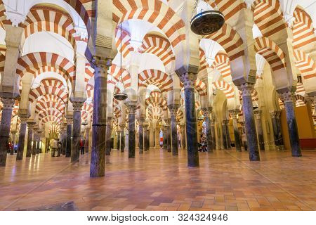 CORDOBA, SPAIN - CIRCA 2014: Hypostyle Hall in the Mosque-Cathedral of Cordoba. The site underwent conversion from a church to a mosque and back again.