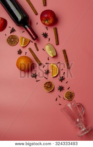 Ingredients For Cooking Gluhwein Or Glogg On The Colored Background