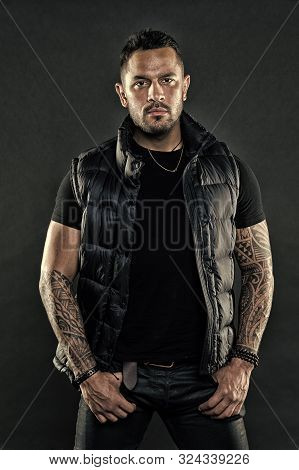 Tattoo Brutal Attribute. Man Confident Unshaven Brutal Appearance Tattooed Arms. Tattoos Great Way E