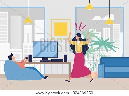Angry Wife Shouting On Husband Playing Video Game. Man Sitting On Sofa In Living Room At Home. Mad F