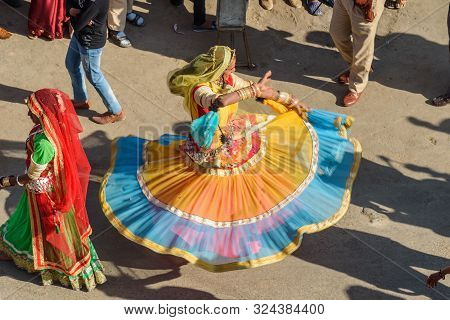 Jaisalmer, India - February 17, 2019: Ceremonial Procession Indian Transgender Or Hijra Dancing In D