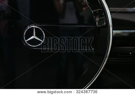 Kyiv, Ukraine - September 12, 2012 : Mercedes Benz Sign Close Up Logo, Low Key Image. Black Vehicle 