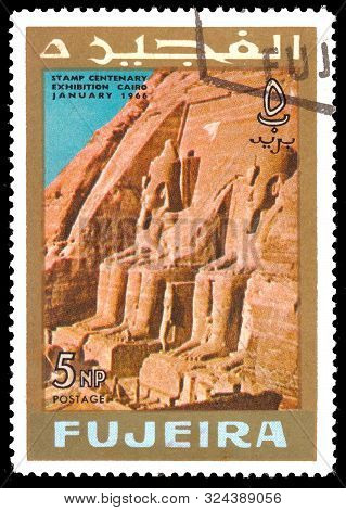 Fujeira - Circa 1966: Stamp Printed In Fujeira Shows Colossi At Abu Simbel With Inscription And Name