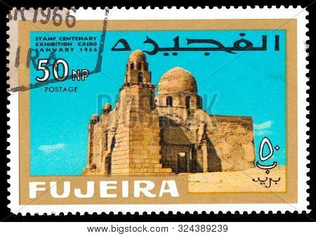 Fujeira - Circa 1966: A Stamp Printed In Fujeira Shows First Christian Church With Inscription And N