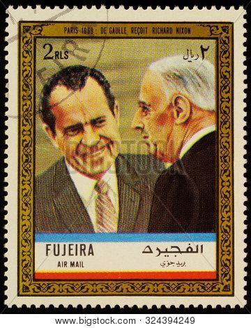 Moscow, Russia - September 26, 2019: A Stamp Printed In Fujeira Shows President De Gaulle Receives R
